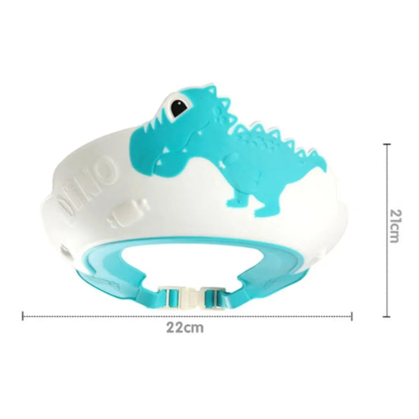The Adjustable Dinosaur Baby Shower Cap for Kids by Alaya Junior showcases a fun blue and white dinosaur design. Crafted from child-friendly materials, it provides bath time protection with dimensions of 22cm in diameter and 21cm in height. The shower cap features an adjustable strap with a buckle closure to ensure a snug fit for little ones.