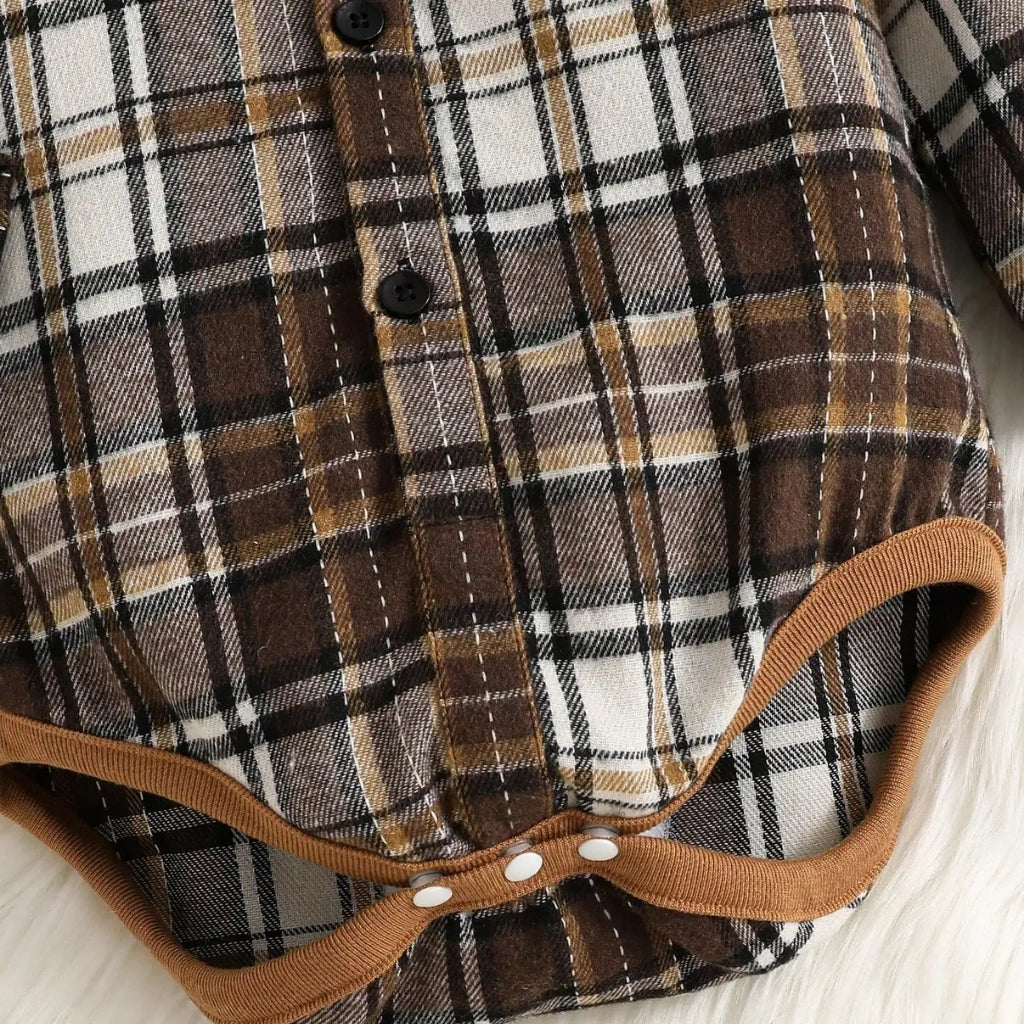 Plaid shirt with brown trim on a white background
