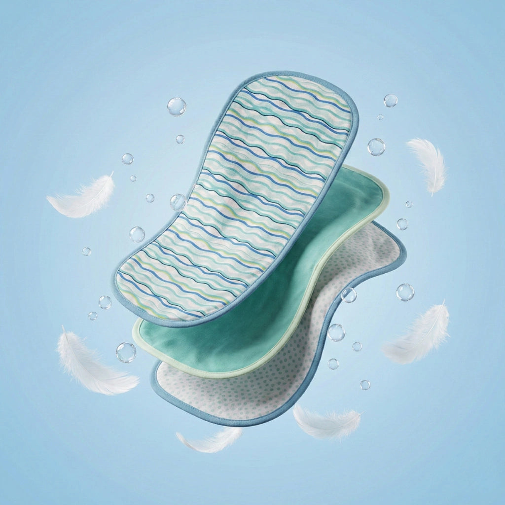 Two green bath mats with wavy patterns on a light blue background