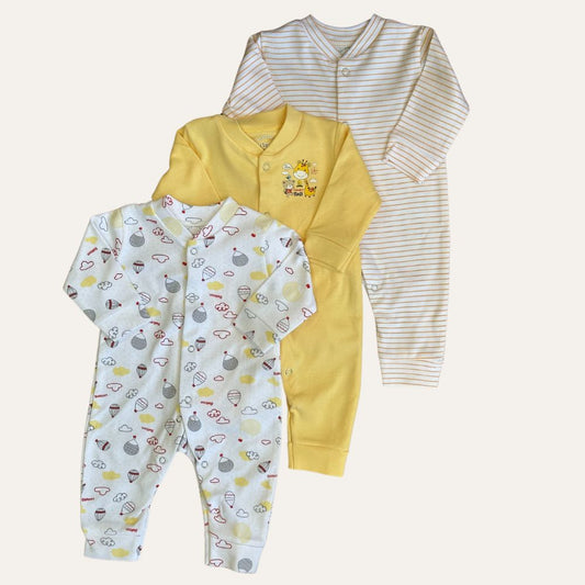Three baby rompers from Carter's Summer Baby Boy/Girl Pack of 3 Rompers (Set of Yellow) are displayed: the first is white with animal prints, the second is solid yellow with animal embroideries on the chest, and the third is white with yellow stripes. Each romper is long-sleeved with snap closures down the front.