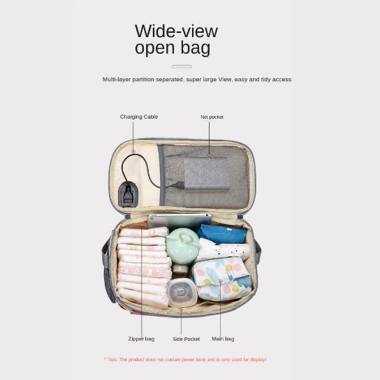 The Alaya Junior Diaper Bag + Stroller Organizer with Charging Cable is a multi-functional travel solution that offers a wide-view open bag displaying organized baby essentials, such as diapers, tissues, a bottle, and wipes. Crafted from water-repellent material and available in vivid color options, this bag includes features like a charging cable, net pocket, zipper bag, side pocket, and main compartment. It emphasizes large access and multi-layer partitioning for convenience.