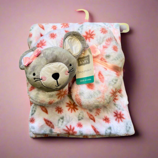 Floral-patterned baby blanket with a plush mouse toy on a white background