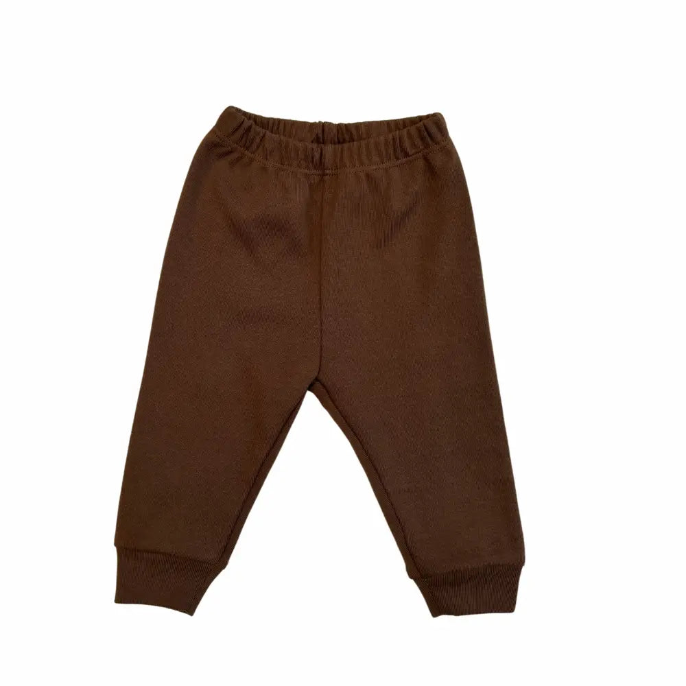 The Alaya Junior Unisex Baby 2 PCS Cotton Imported Shirt And Trouser Set features brown children's pants with an elastic waist and cuffs, adorned with stylish deer embroidery. The soft and comfortable fabric makes these pants perfect for casual wear, serving as a versatile baby outfit showcased against a plain white background.