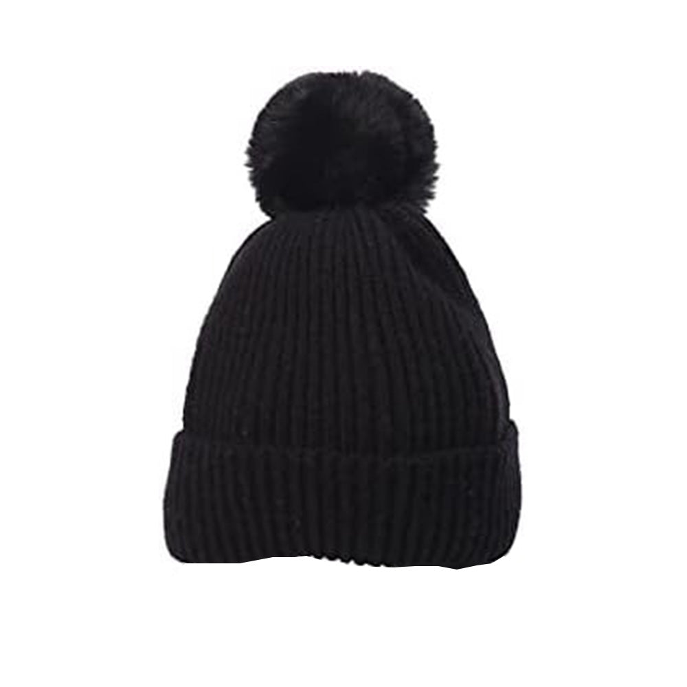 The Hudson Baby Knitted Cap by Alaya Junior, designed for ages 0-12 months, features a ribbed black knit and large pom-pom, showcased against a white background.