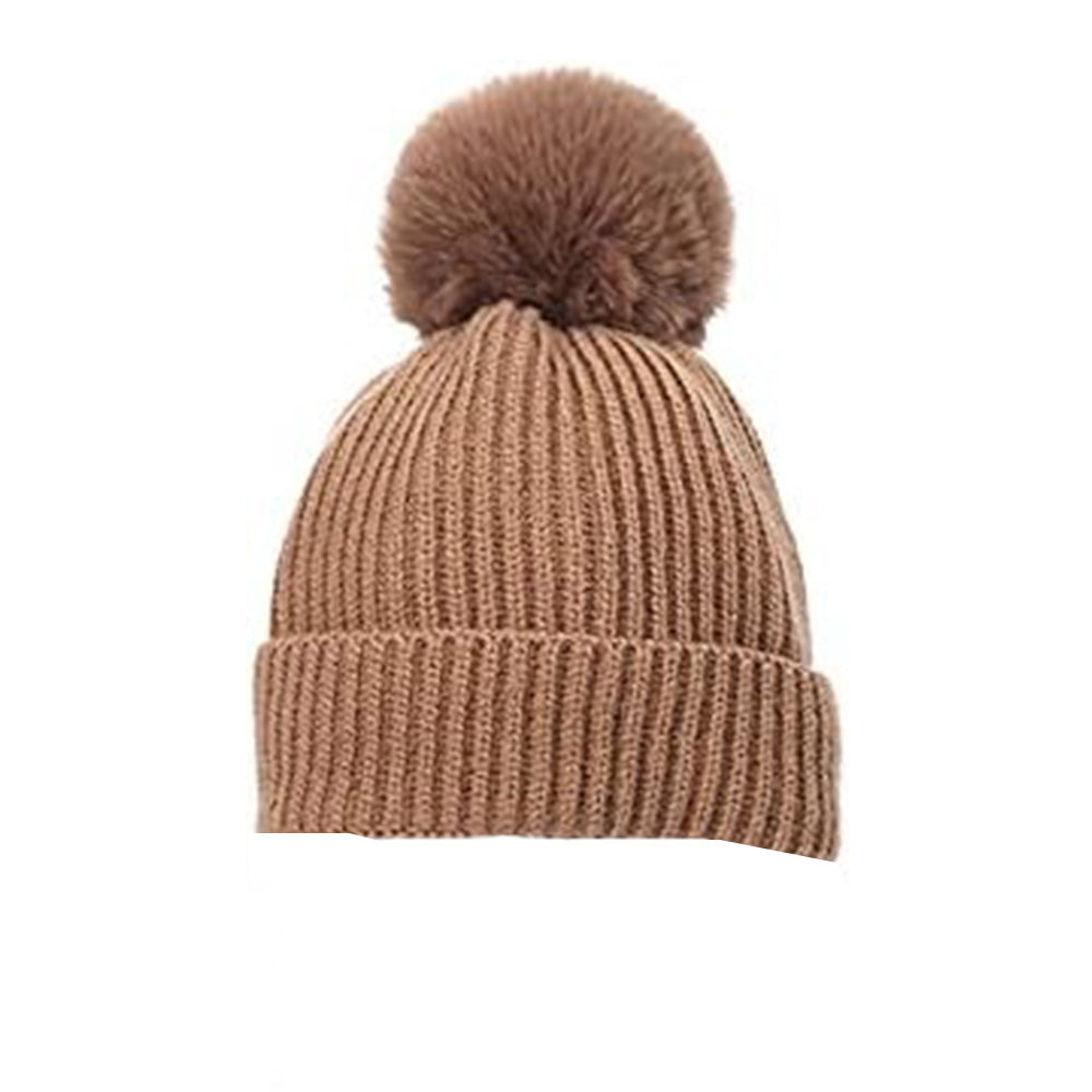 The Alaya Junior Hudson Baby Knitted Cap (0-12 Months) has a large, playful pom-pom on its brown surface, highlighting its premium knitting on a crisp white background.