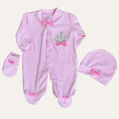 The Alaya Junior "Charming Trio: MJ Baby Bow Romper Set with Mittens and Cap - Adorable Full Sleeves" combines a onesie, mittens, and hat, each adorned with pink plaid accents. A crown design on the chest blends comfort with fashion effortlessly.