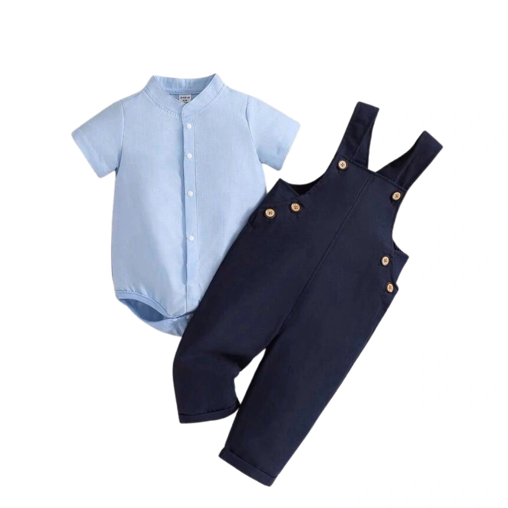 Light blue baby romper and navy blue overalls on a white background