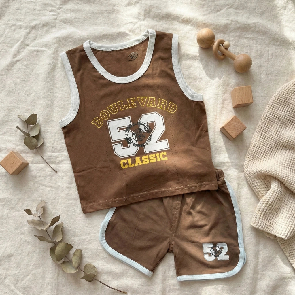 Children's brown sleeveless top and shorts set with 'Boulevard 52 Classic' text on a light fabric background.