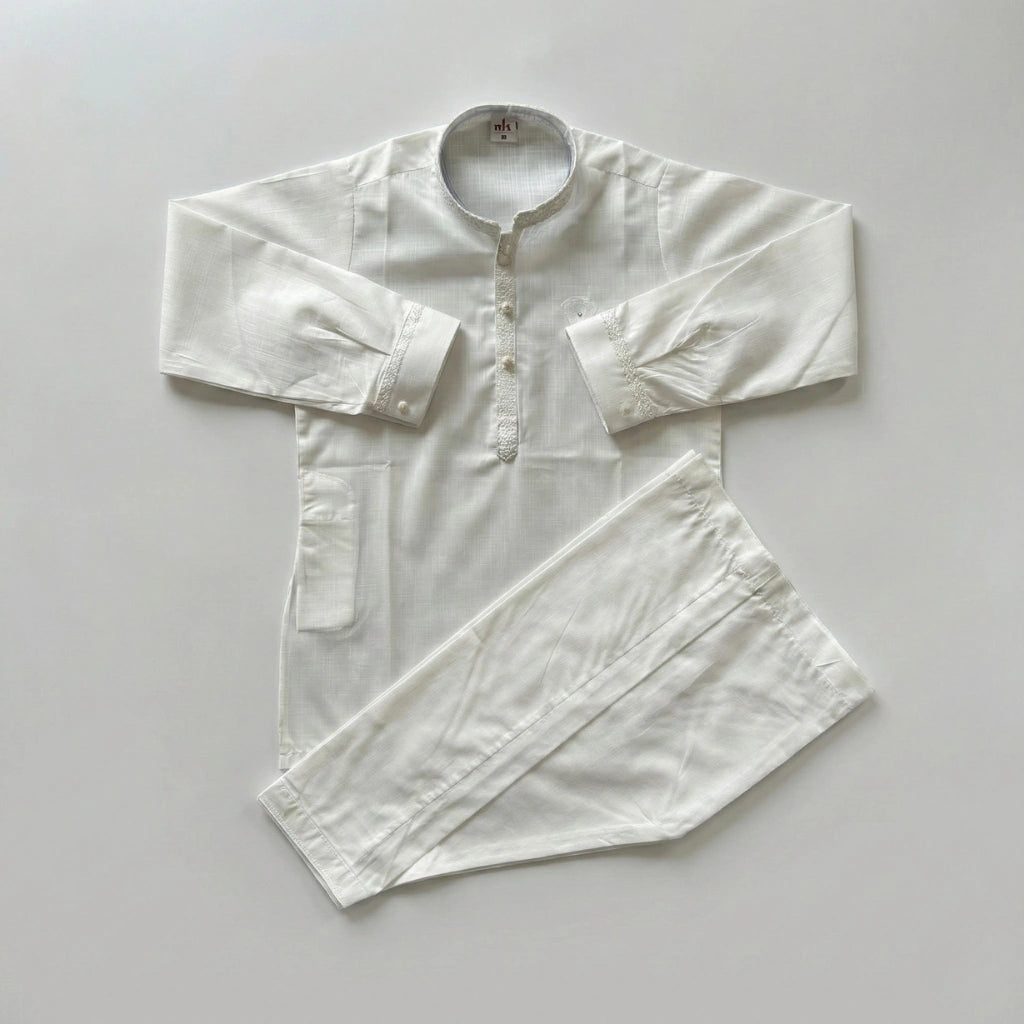 White shirt with rolled-up sleeves on a light gray background