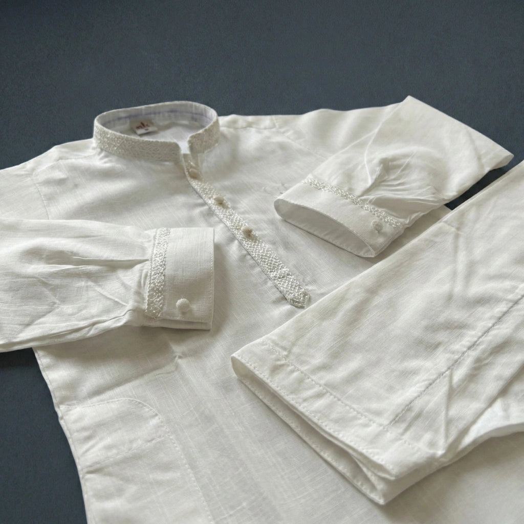 White embroidered shirt on a dark background