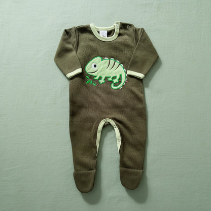 Green baby onesie with a chameleon design on a white background