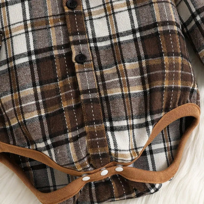 Plaid shirt with brown trim on a white background