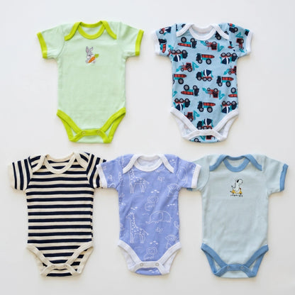 Five baby bodysuits with different patterns on a light background