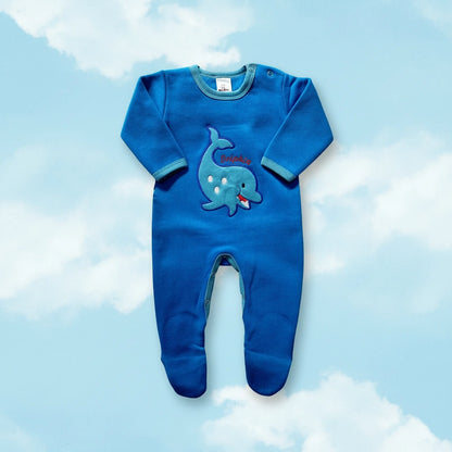 Blue baby onesie with a dolphin design on a white background