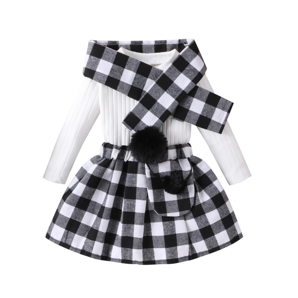 Black --- Black and white checkered dress with matching scarf on a white background