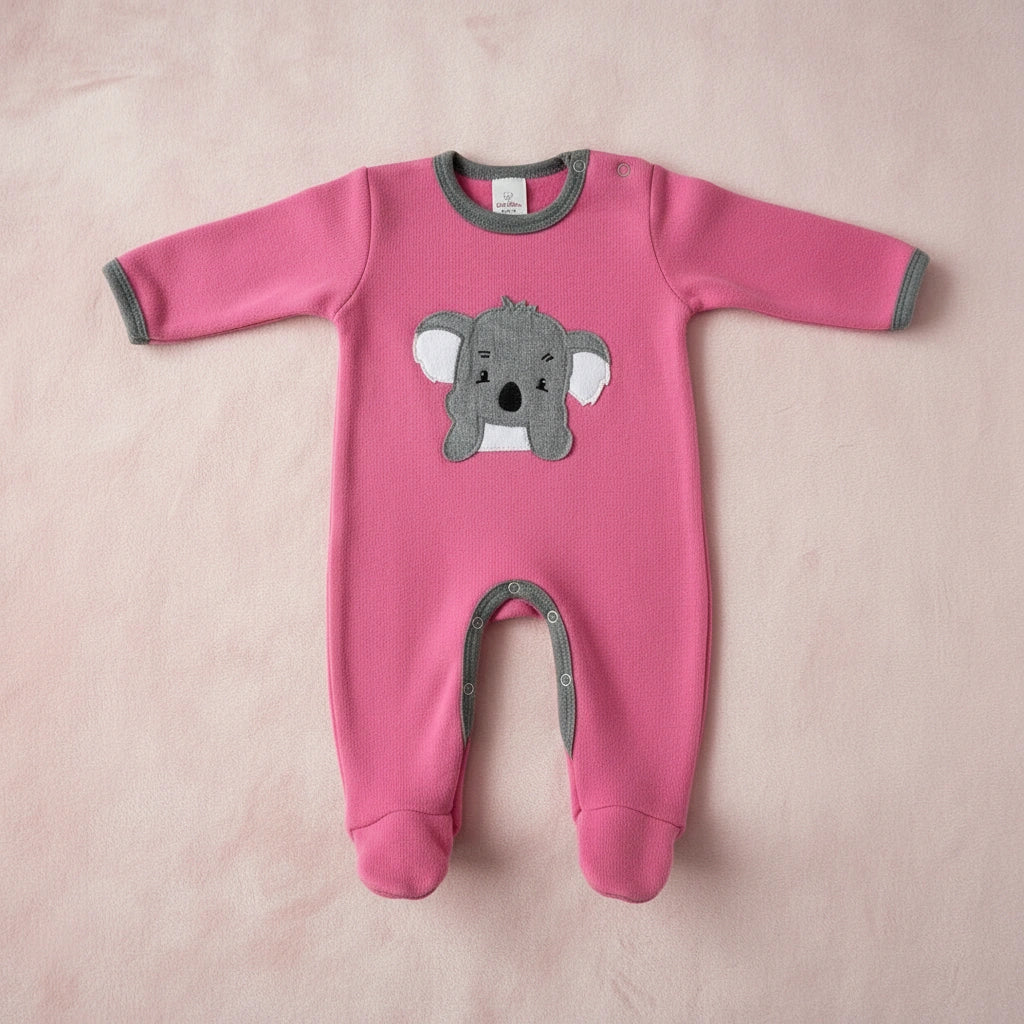 Pink baby onesie with a koala design on a white background