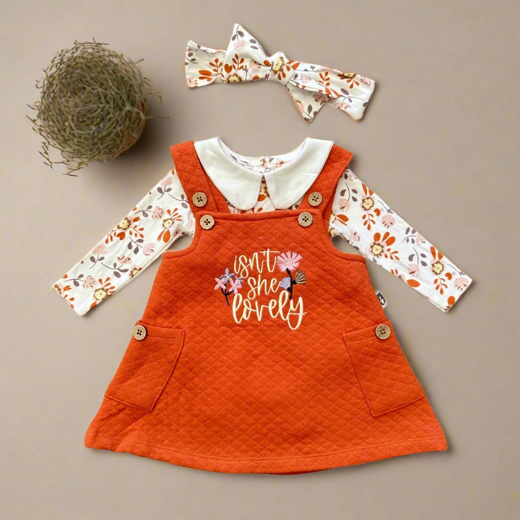 Orange dress with floral long-sleeve shirt and headband on a white background