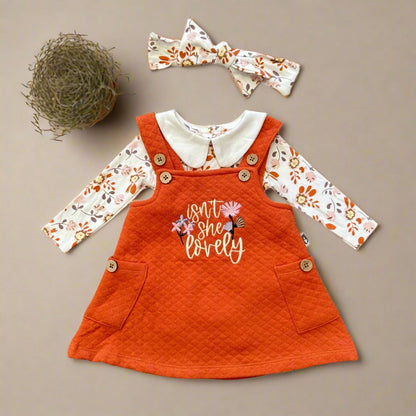 Orange dress with floral long-sleeve shirt and headband on a white background