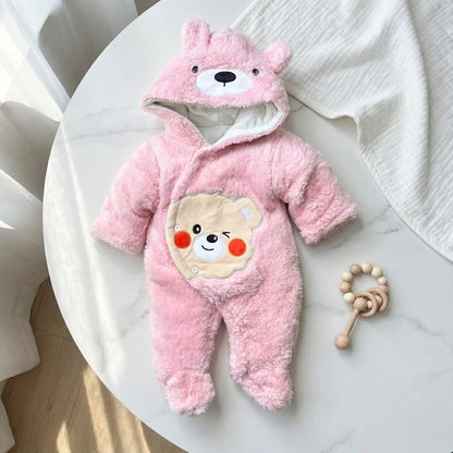 Pink baby snowsuit with bear design on a white background