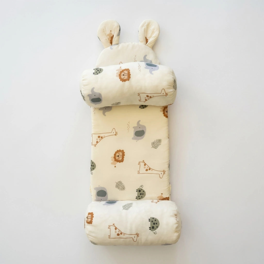 Set of three baby pillows with colorful patterns on a white background
