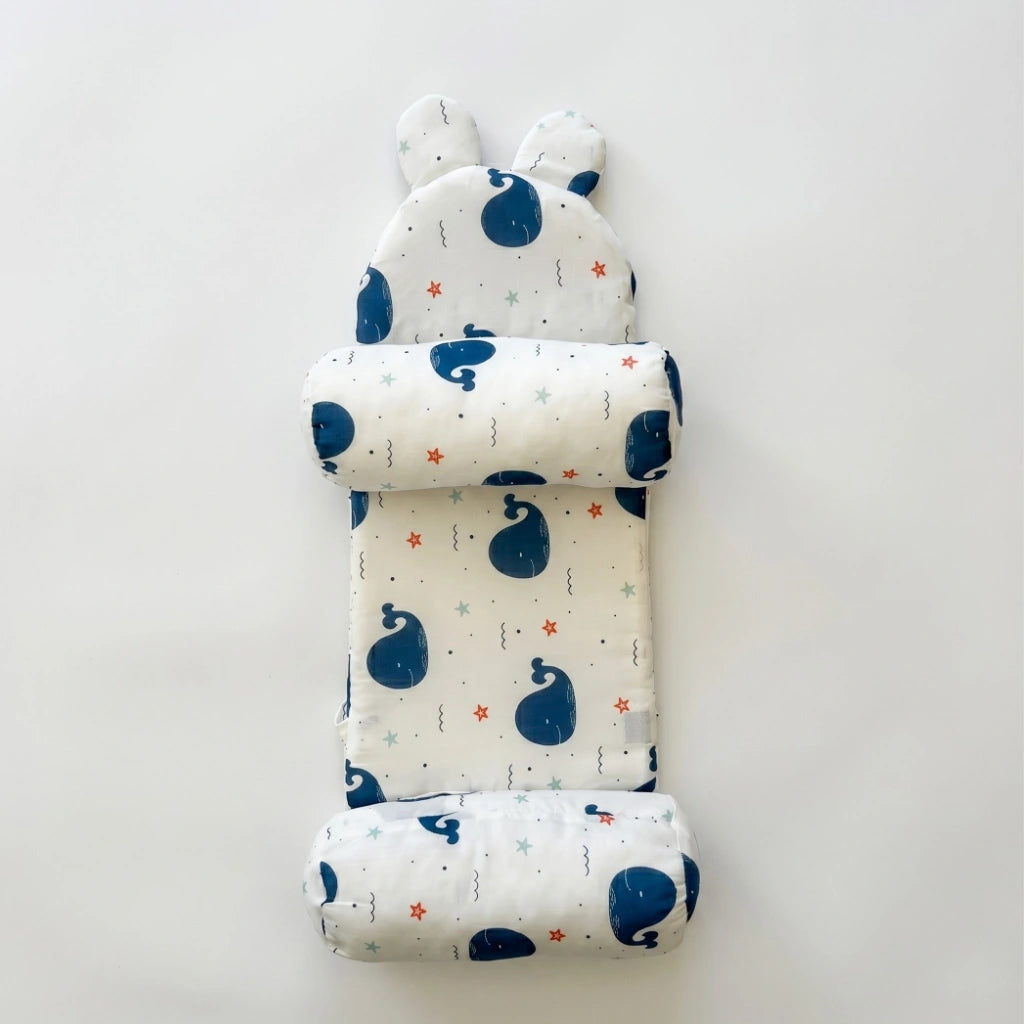 Baby nest with blue whale pattern on a white background