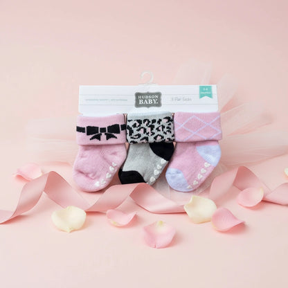 Set of Hudson Baby baby socks on a white background