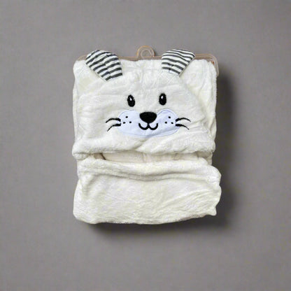 White plush toy with a cat face design on a white background