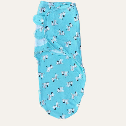 The Alaya Junior Baby Boys Newborn Summer Swaddles in turquoise boast a whimsical white and black zebra pattern, neatly folded to reveal multiple zebras in playful poses on its soft, lightweight fabric.