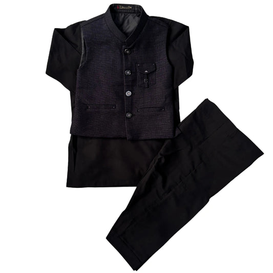 A black Indian ethnic suit set consisting of a textured waistcoat, a matching long-sleeve shirt, and trousers, laid out on a solid white background.