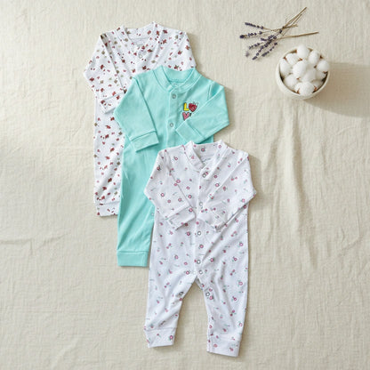 Three baby rompers with floral patterns on a white background