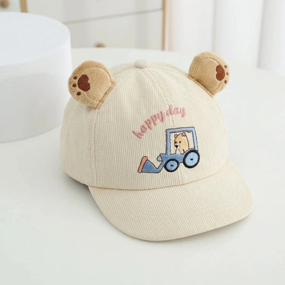 Beige cap with bear ears and 'Happy Day' embroidery on a white surface