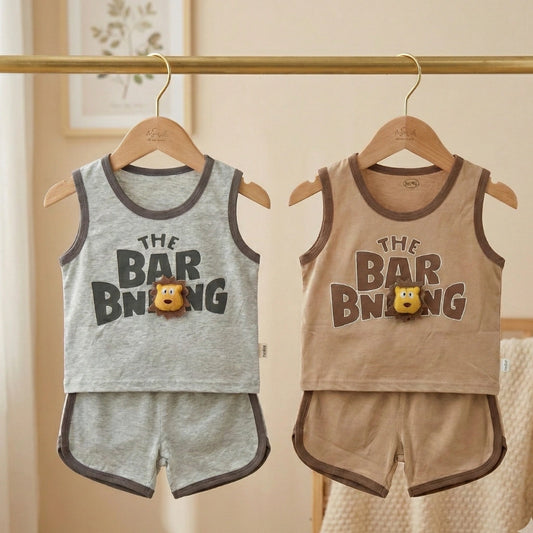 Two children's tank tops and shorts sets hanging on a rack with 'The Bar Buing' text.