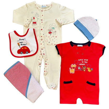Baby clothing set with a onesie, bib, hat, and blanket on a white background