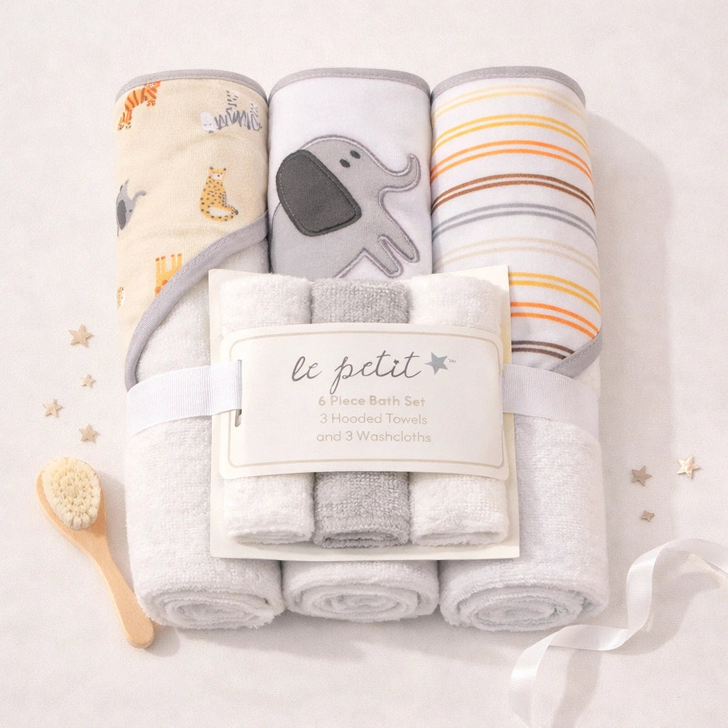 Baby bath set with towels and washcloths on a light background