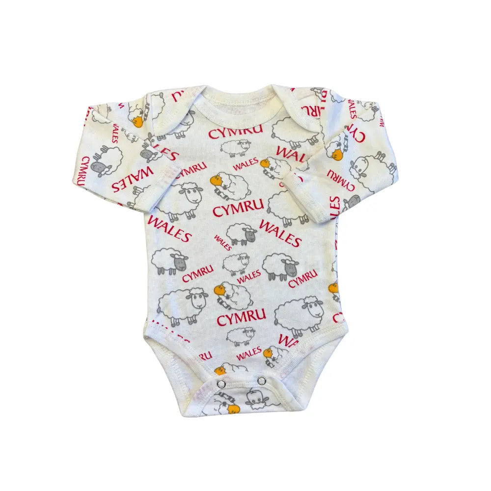 A durable and machine-washable white long-sleeved baby onesie from Carter's, part of the Unisex Baby Full Sleeves Bodysuits Pack of 5 – Red-Themed collection, featuring a repeated pattern of sheep and the words "CYMRU" and "WALES" in red and black text. The bold, gender-neutral design includes overlapping shoulders and snaps at the bottom for easy dressing and diaper changes.