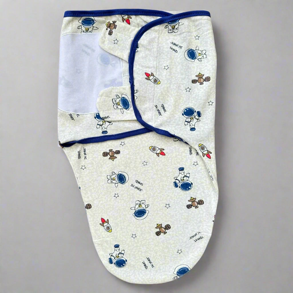 Baby swaddle with space-themed design on a white background
