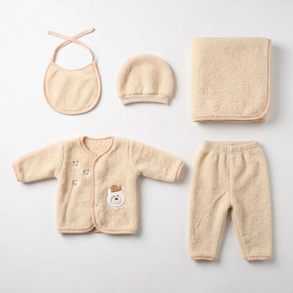 A 5-piece baby fleece clothing set in a soft cream-beige color, laid out neatly on a light gray background. The set includes a long-sleeve cardigan with a bear face patch, a pair of pants, a bonnet, a bib, and a folded blanket.