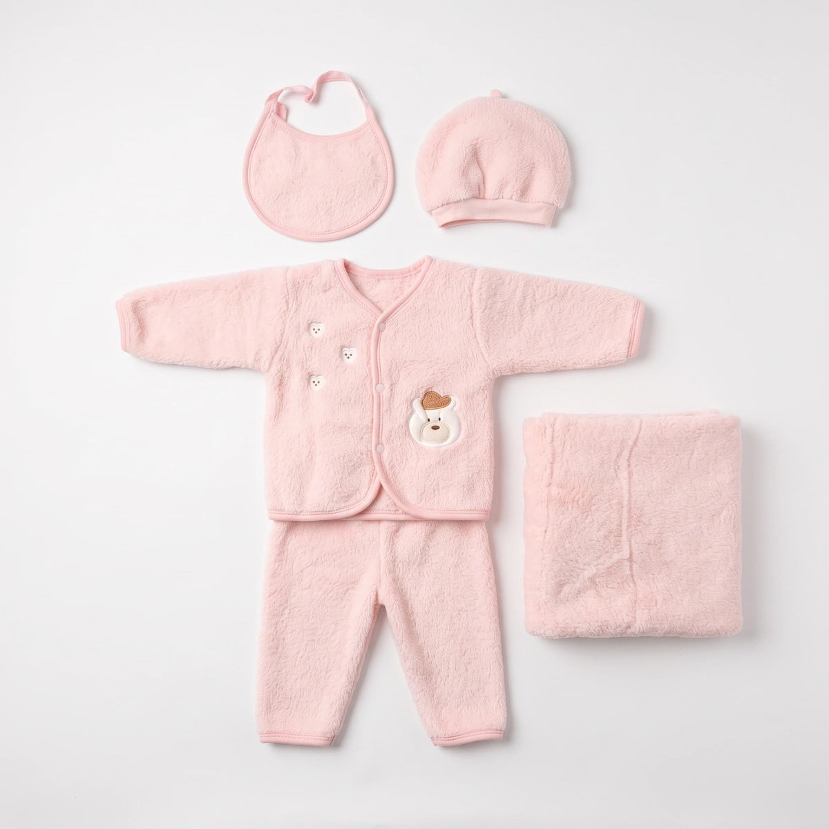 A baby fleece clothing set in light pink, including a long-sleeve cardigan, matching pants, a bib, a beanie, and a folded blanket, arranged on a light gray background.
