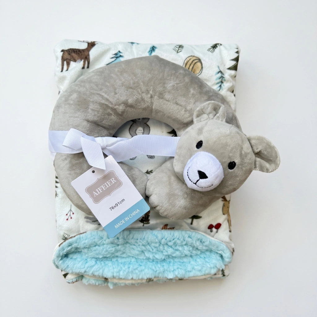 Gray plush toy with a tag on a white background