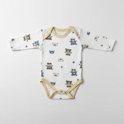 A long-sleeve baby bodysuit with a white base, beige trim, and an all-over print of cartoon teddy bears and stars in blue, brown, and beige, laid flat on a light gray background.