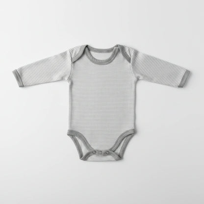 A long-sleeve baby bodysuit with thin gray and white horizontal stripes, featuring solid gray trim at the crew neck, cuffs, and crotch, laid flat on a light gray background.