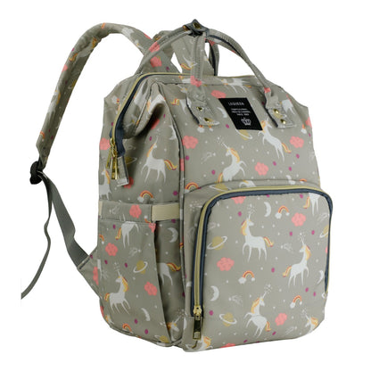 Introducing the LEQUEEN Unicorn Mommy Diaper Bag by Alaya Junior: a stylish gray backpack decorated with vibrant unicorns, rainbows, stars, clouds, and crescent moons. It offers multiple compartments, including a front zippered pocket and two side pockets. With its gold zippers and adjustable padded straps for comfortable carrying, this bag is perfect for moms to carry essentials for their newborn baby.