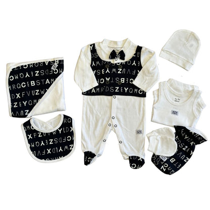 Introducing the Alaya Junior 7pcs Chicco Bow Romper Starter Set with Petite Waistcoat, a perfect infant clothing set for your little one in Pakistan. This adorable collection includes a charming white long-sleeve onesie adorned with black alphabet print, a matching bib, a white hat, a pair of mittens, and an elegant white blanket featuring the same black alphabet pattern on one side.